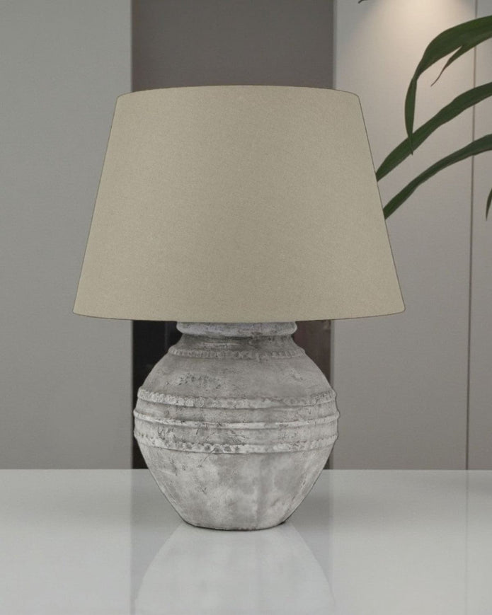 Athena Stone Regola Lamp by Hill Interiors, Mediterranean artisan home decor with textured stone finish and elegant design.