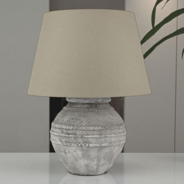 Athena Stone Regola Lamp by Hill Interiors, Mediterranean artisan home decor with textured stone finish and elegant design.