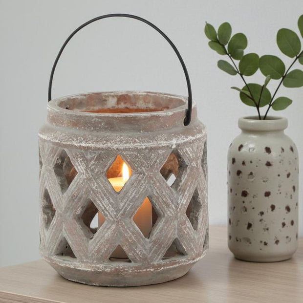 Siena matte brown stone lattice hurricane lantern for home decor, featuring a durable design with decorative cutouts.