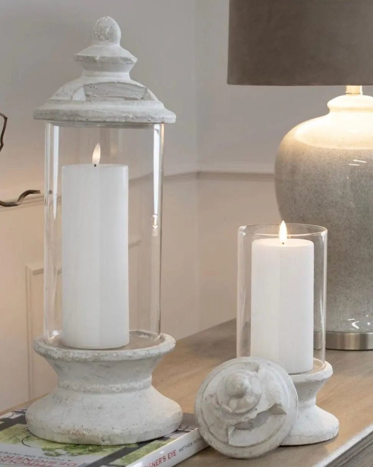 Stone lidded hurricane candle lantern from Hill Interiors, featuring a rustic design with glass sides and a sturdy stone lid.