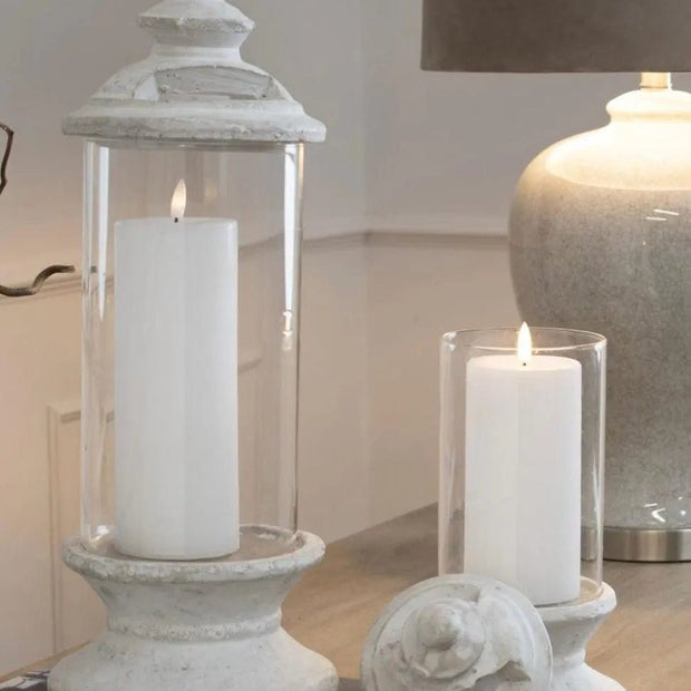 Stone lidded hurricane candle lantern from Hill Interiors, featuring a rustic design with glass sides and a sturdy stone lid.