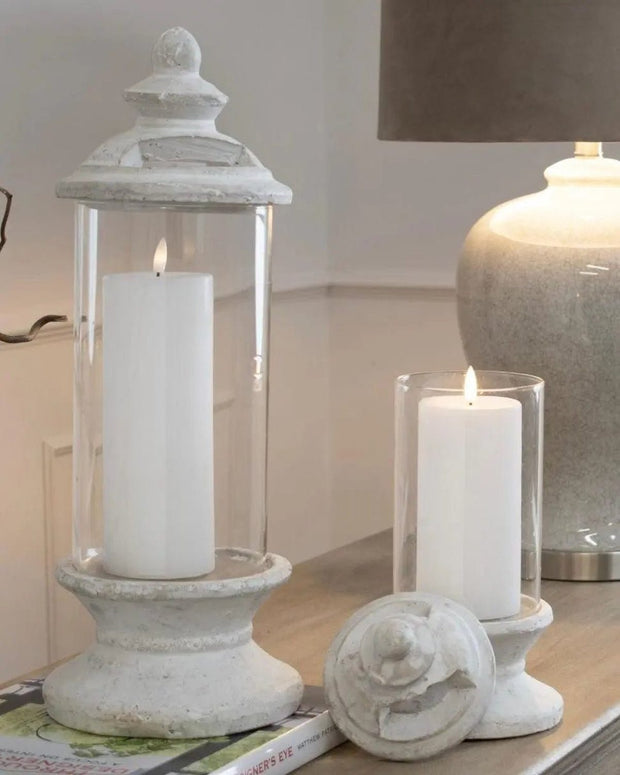 Stone lidded hurricane candle lantern from Hill Interiors, featuring a rustic design with glass sides and a sturdy stone lid.