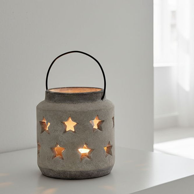 Stone Star Hurricane Lantern by Hill Interiors, a decorative home decor piece with a stone star design and glass enclosure.