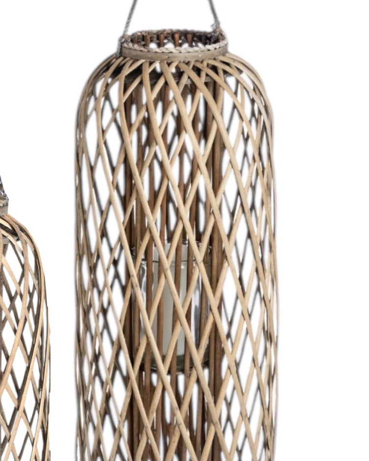 Tall natural rattan wicker garden candle lantern for home decor, featuring a rustic design with glass insert for candles.