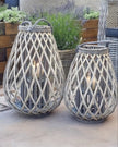 Natural rattan wicker bulbous garden candle lantern for home decor, featuring a stylish, handcrafted design by Hill Interiors.
