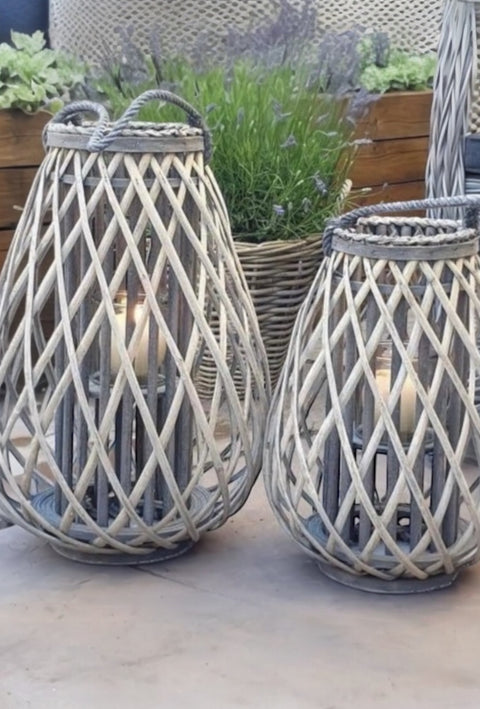 Natural rattan wicker bulbous garden candle lantern for outdoor home decor, by Hill Interiors.