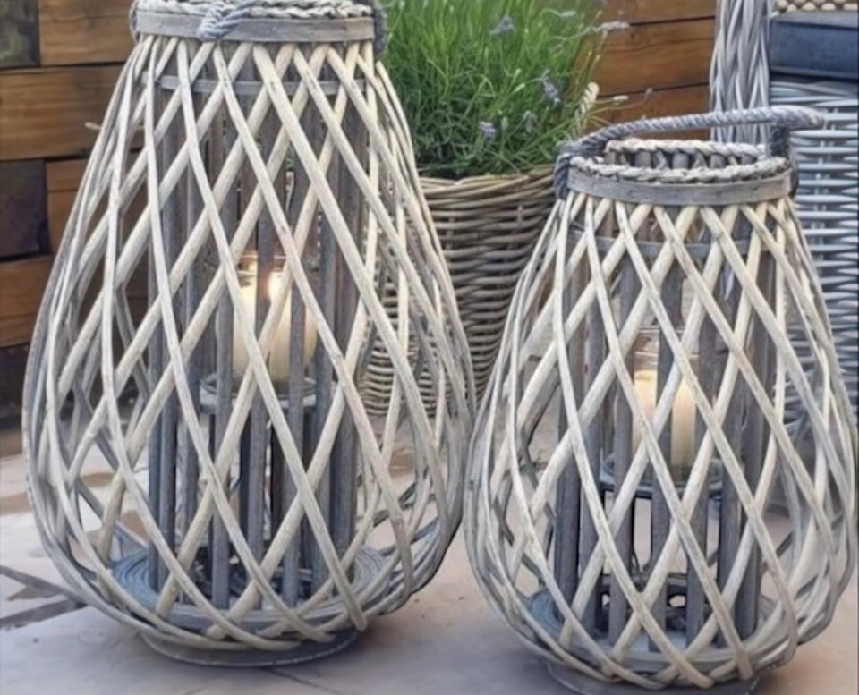 Natural rattan wicker bulbous garden candle lantern for outdoor home decor, by Hill Interiors.