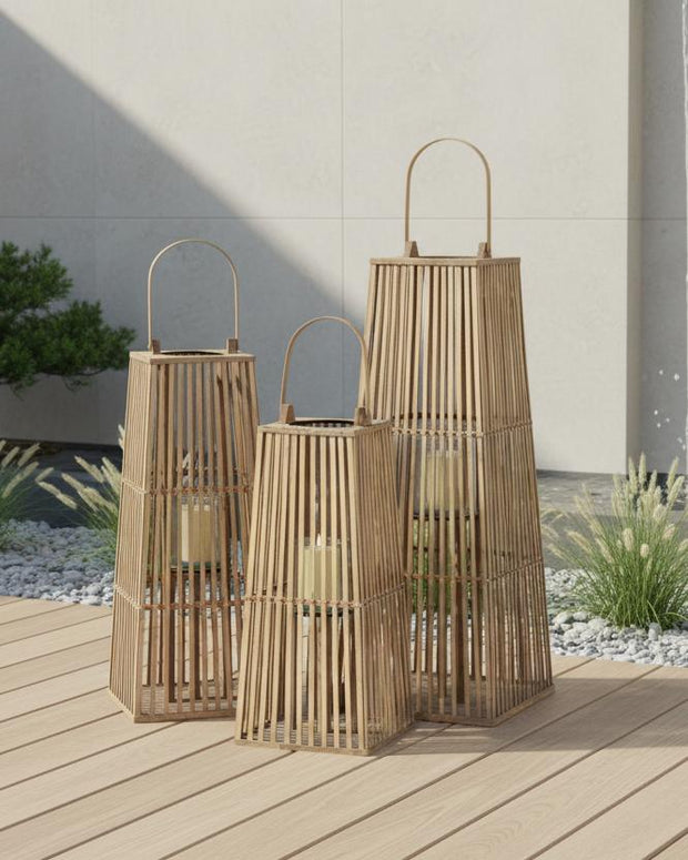 Natural rattan wicker silo garden candle lantern for home decor, featuring a rustic design with a glass holder inside.