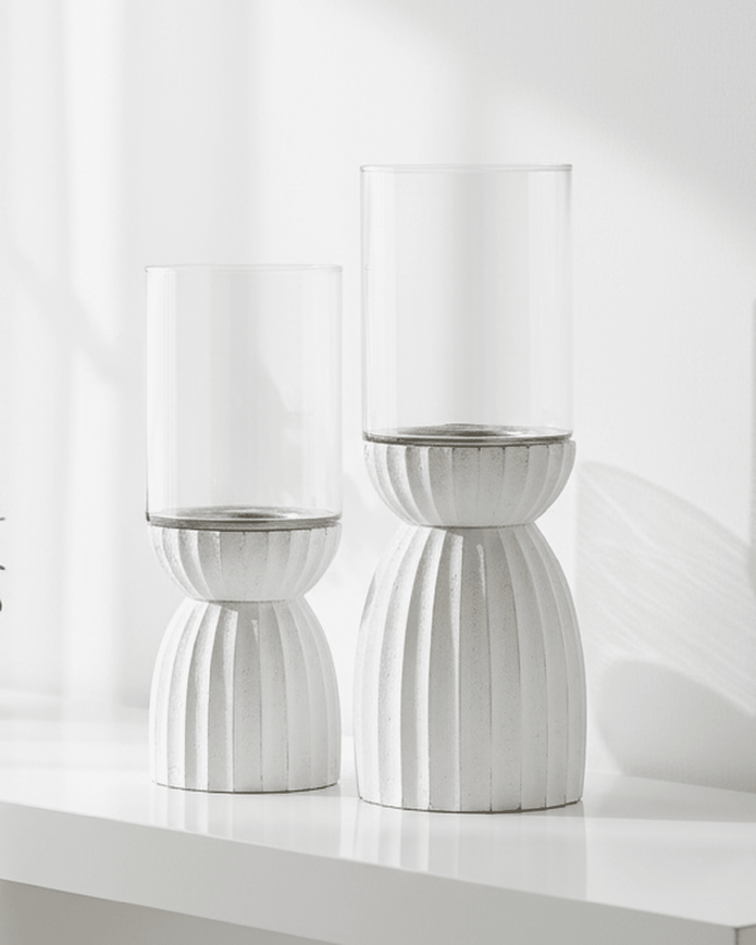 White carved hurricane lantern for home decor, featuring intricate design and sturdy glass, ideal for stylish interior accents.