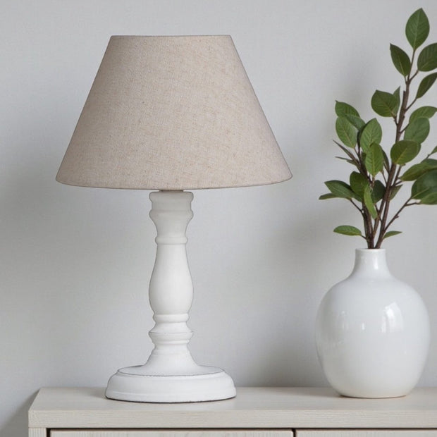 Small whitewashed wood lamp by Hill Interiors, 30cm tall, with a rustic lighting design and natural wood finish.