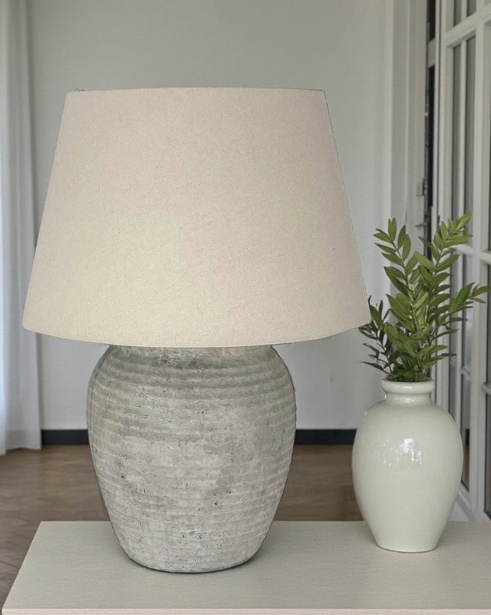 Harrogate Ribbed Stone Lamp by Hill Interiors, stylish lighting fixture with textured ribbed surface in a natural stone finish.