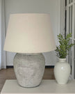Harrogate Ribbed Stone Lamp by Hill Interiors, stylish lighting fixture with textured ribbed surface in a natural stone finish.