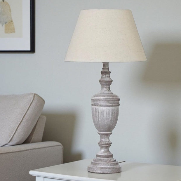 Weathered grey wooden lamp from Hill Interiors, 45cm tall with intricate detailing, perfect for stylish lighting.