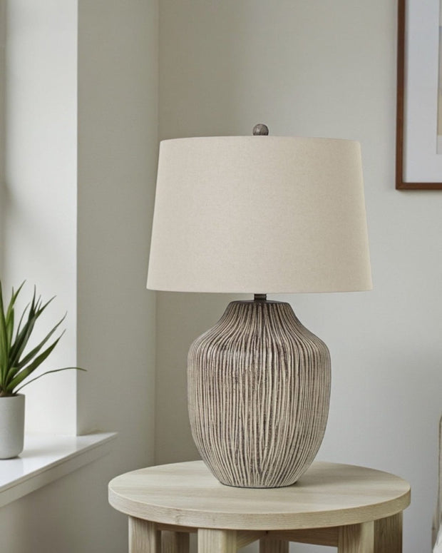 Ochre brown wooden lamp with warm linen shade, 71cm tall, modern lighting from Hill Interiors.