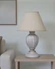 Otem Compact Urn Lamp by Hill Interiors with 25cm distressed pewter linen shade, decorative lighting for living spaces.