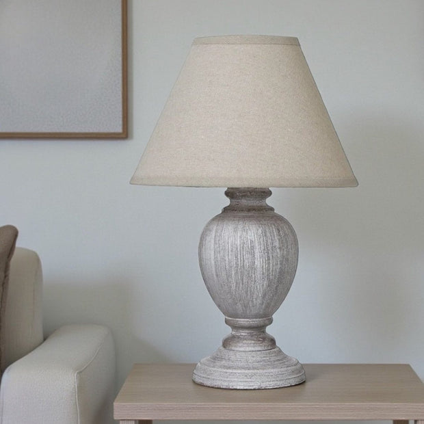 Otem Compact Urn Lamp by Hill Interiors with 25cm distressed pewter linen shade, decorative lighting for living spaces.