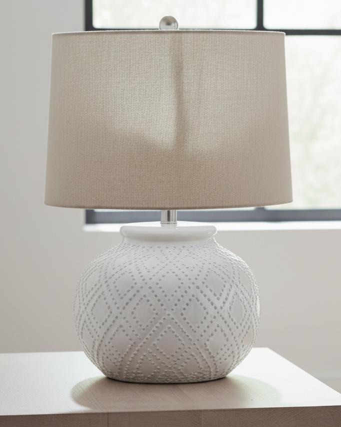 White beaded ceramic lamp by Hill Interiors, squat-shaped lighting fixture with textured surface and decorative design.