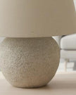 Tuscan Neutral Stone Lamp by Hill Interiors, 40cm tall, showcasing a textured stone finish and elegant lighting design.