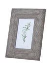 Neutral wooden photo frame with woven border, ideal for 4x6 photos, from Hill Interiors. Elegant and natural home decor accessory.