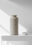 Large beige ceramic Nero vase with intricate patterned design, ideal for decorative floral arrangements.