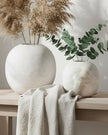 Darcy Globe Stone Vase by Hill Interiors featuring a round shape and textured stone finish for elegant home decor.
