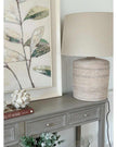 Wooden framed wall art featuring a canvas painting of vibrant green leaves by Hill Interiors.