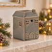 Widdop & Co ceramic house-shaped wax melt burner with chimney and window cutouts