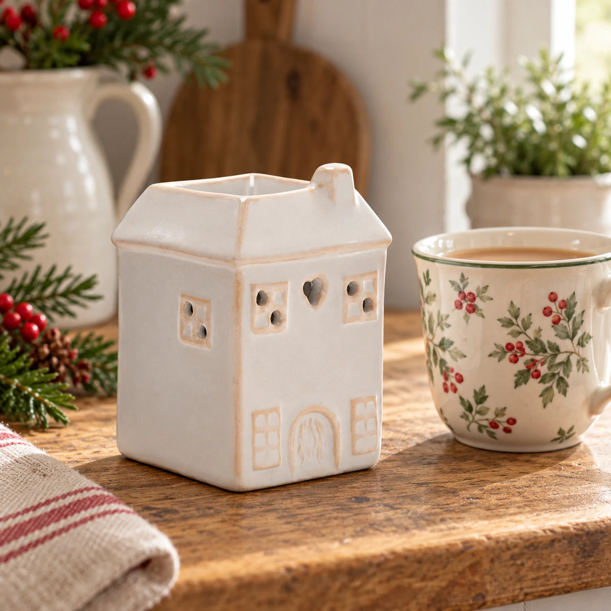 Widdop & Co ceramic house shaped wax melt burner with chimney and window cutouts