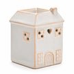 Widdop & Co white ceramic house shaped wax melt burner on a clean studio background