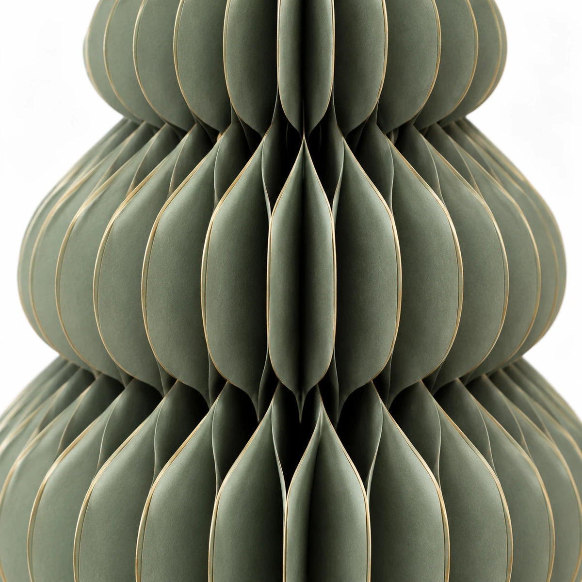 Large green paper Christmas tree by Satchville, lifesize standing holiday decoration with detailed paper texture.
