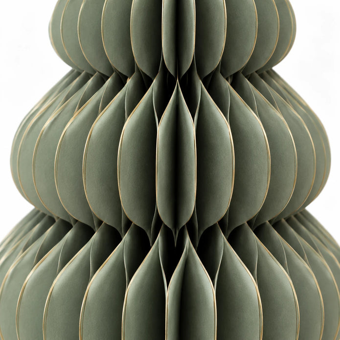 Large green paper Christmas tree by Satchville, lifesize standing holiday decoration with detailed paper texture.