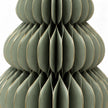 Large green paper Christmas tree by Satchville, lifesize standing holiday decoration with detailed paper texture.