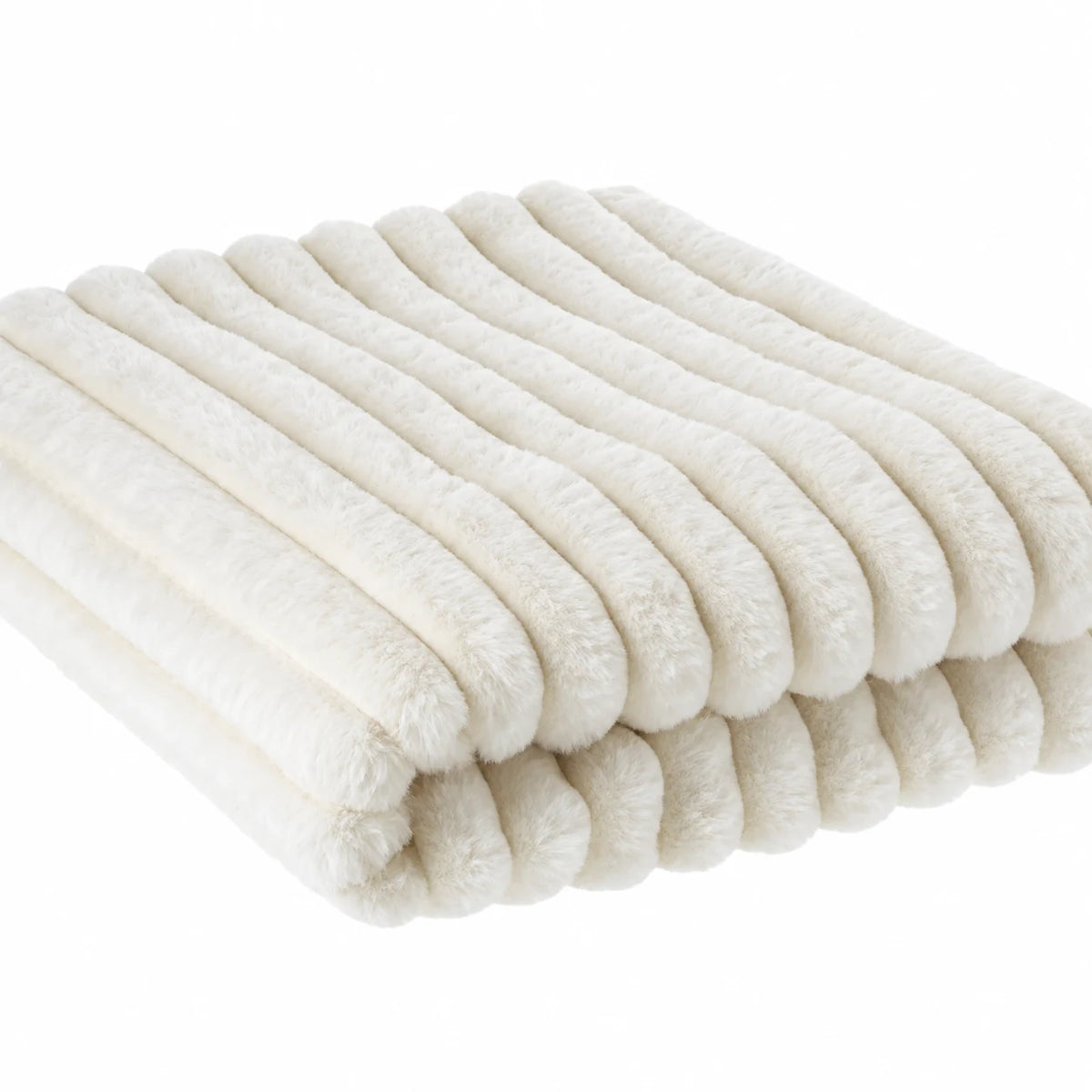 Close-up of the ivory throw's fluffy faux fur fibres and raised ribbed texture