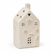 Large 17cm ivory ceramic LED house with raised flowers and gold-coloured details, studio view, LED switched off.