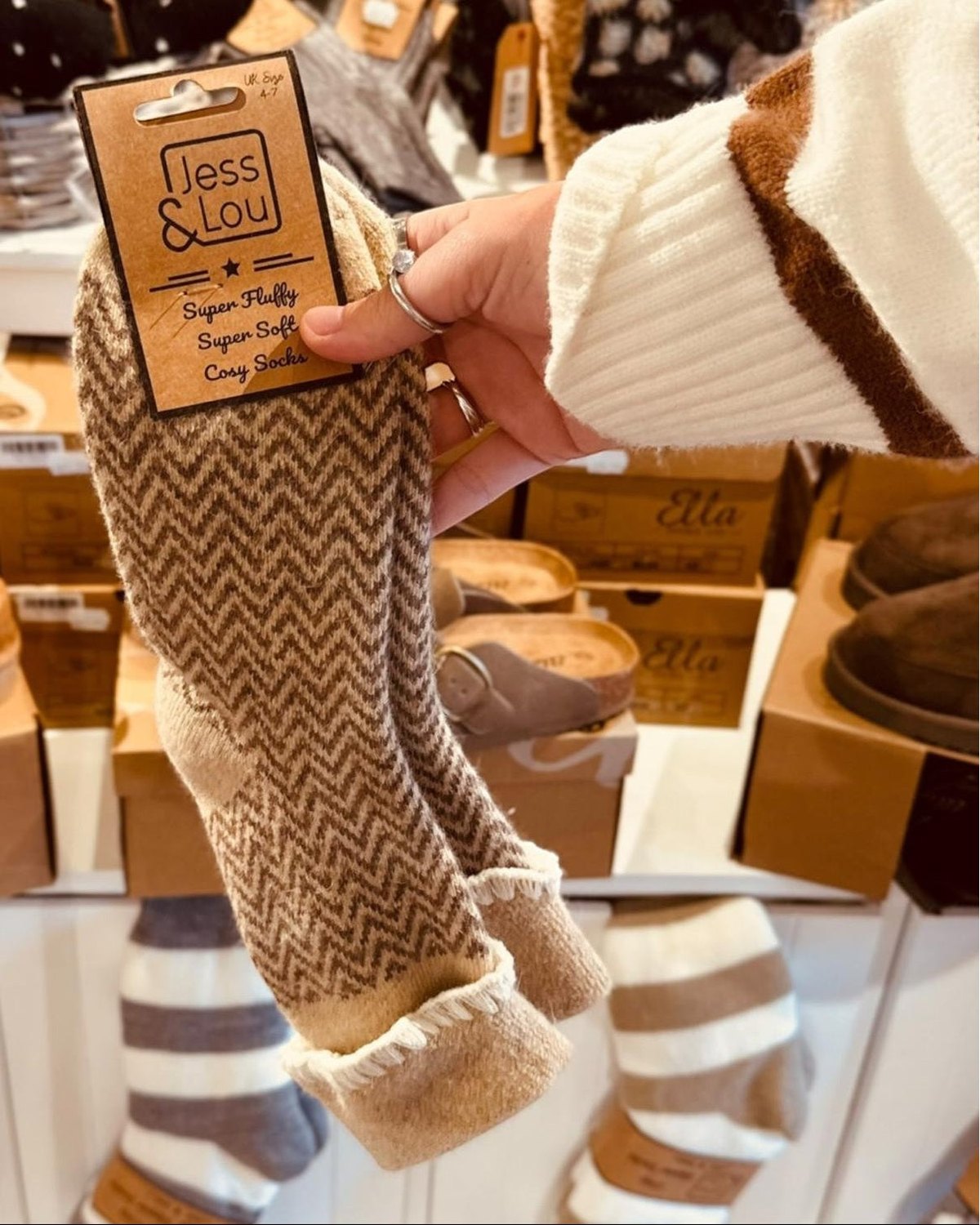 Beige herringbone Jess & Lou Cosy Cuff Socks, cozy knit accessories with ribbed cuffs and textured pattern.