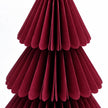 Close-up of burgundy paper folds and scalloped tier edges.