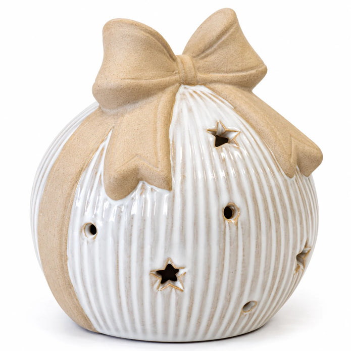 Close-up of the beige ceramic bow, white ribbed glaze and star cutout on the large LED bauble