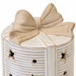 Close-up of the cream ceramic bow topper and ribbon on the LED present.