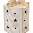 Close-up of the ribbed ceramic surface and star-shaped light openings on the present.