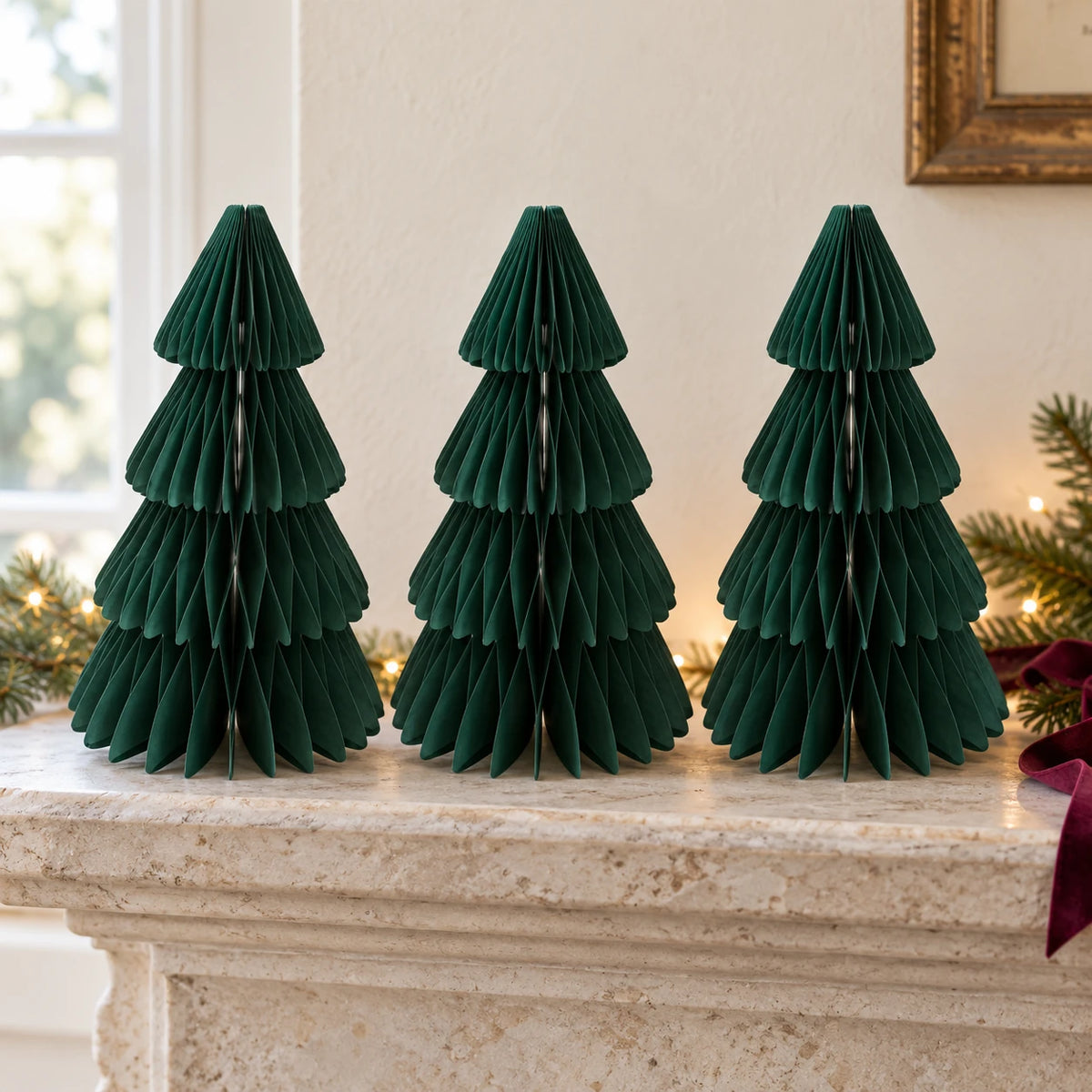 Set of three green medium paper Christmas trees by Satchville, festive holiday decor for mantel or tabletop.