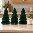 Set of three green medium paper Christmas trees by Satchville, featuring textured paper with a festive holiday design.