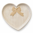 Satchville large white heart plate with bow detail on a studio background