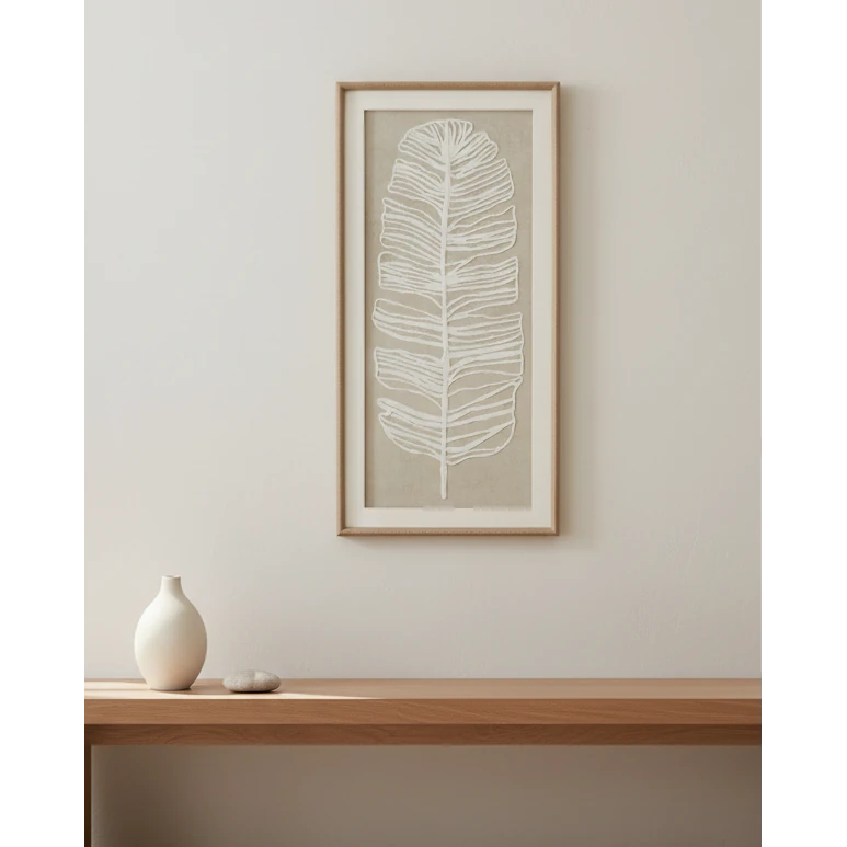 Large white feather wall art in a frame by Hill Interiors, featuring a delicate plume design for elegant home decor.