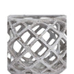 Large round ceramic lattice hurricane lantern, decorative home decor piece with intricate cut-out design.