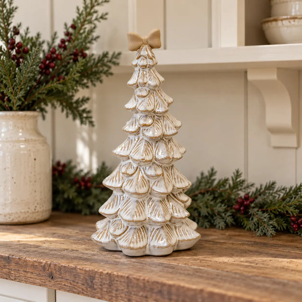 Large stone-glazed ceramic bendy Christmas tree with cream bow on top, festive holiday decor by Satchville.