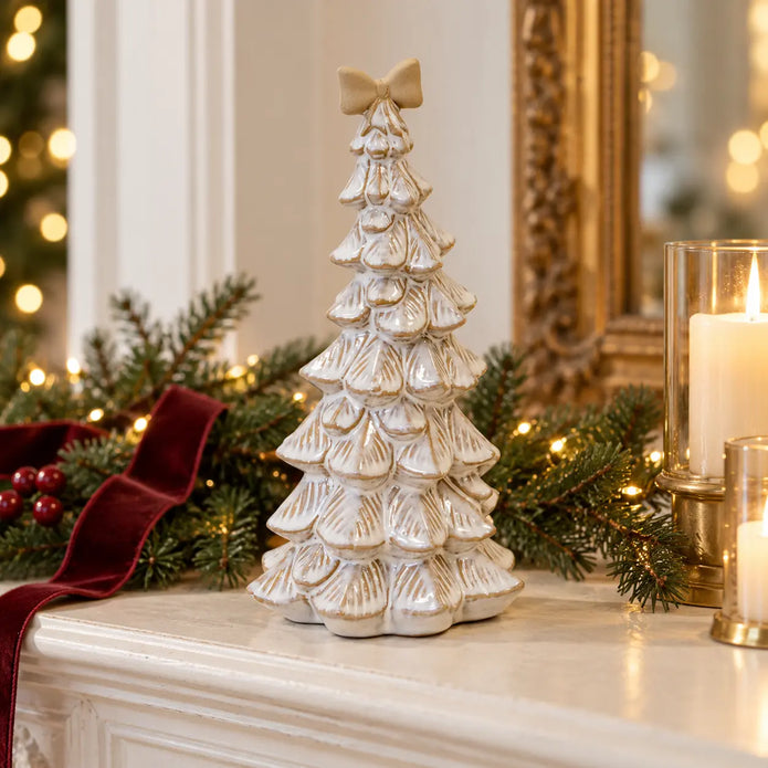 Large stone glazed ceramic bendy Christmas tree with cream bow styled in a christmas mantel scene