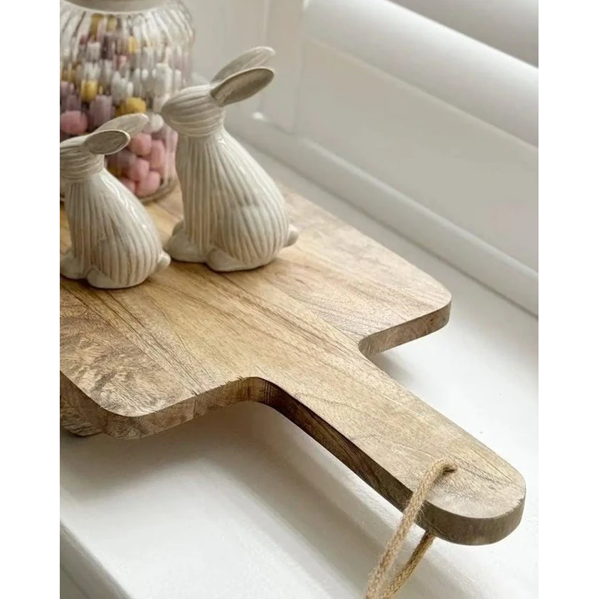 Large Wooden Footed Graze Tapas Board, wooden board on a kitchen counter showing the handle and hanging cord