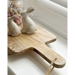 Large Wooden Footed Graze Tapas Board, wooden board on a kitchen counter showing the handle and hanging cord