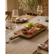 Large Wooden Footed Graze Tapas Board, wooden handled board serving food on a dining table