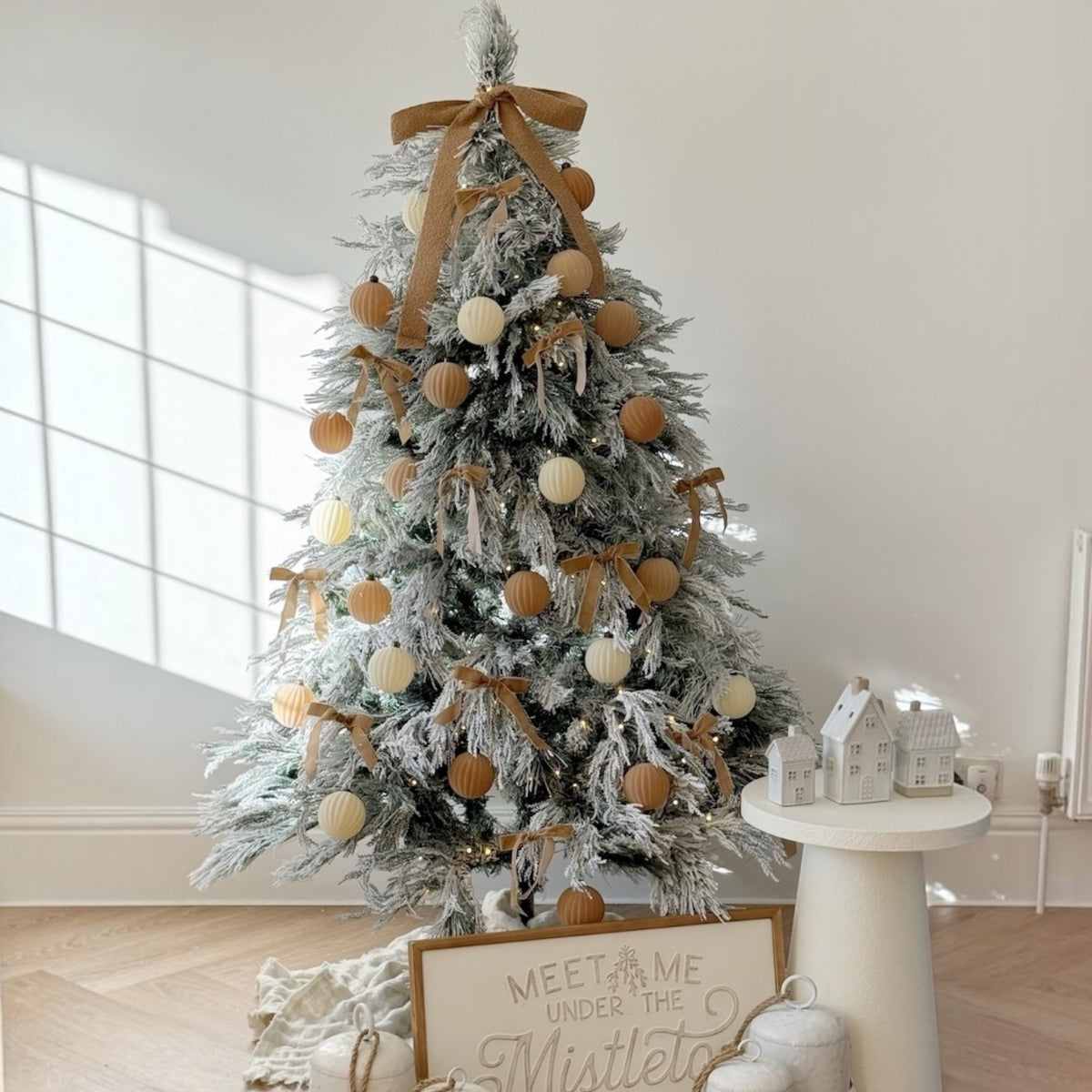 7ft pre-lit luxury snowy Lorax Christmas tree by Starlight Express, decorated with warm white lights